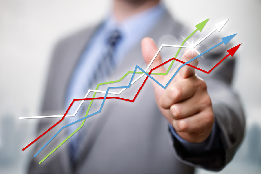 bigstock-Businessman-pointing-to-growth